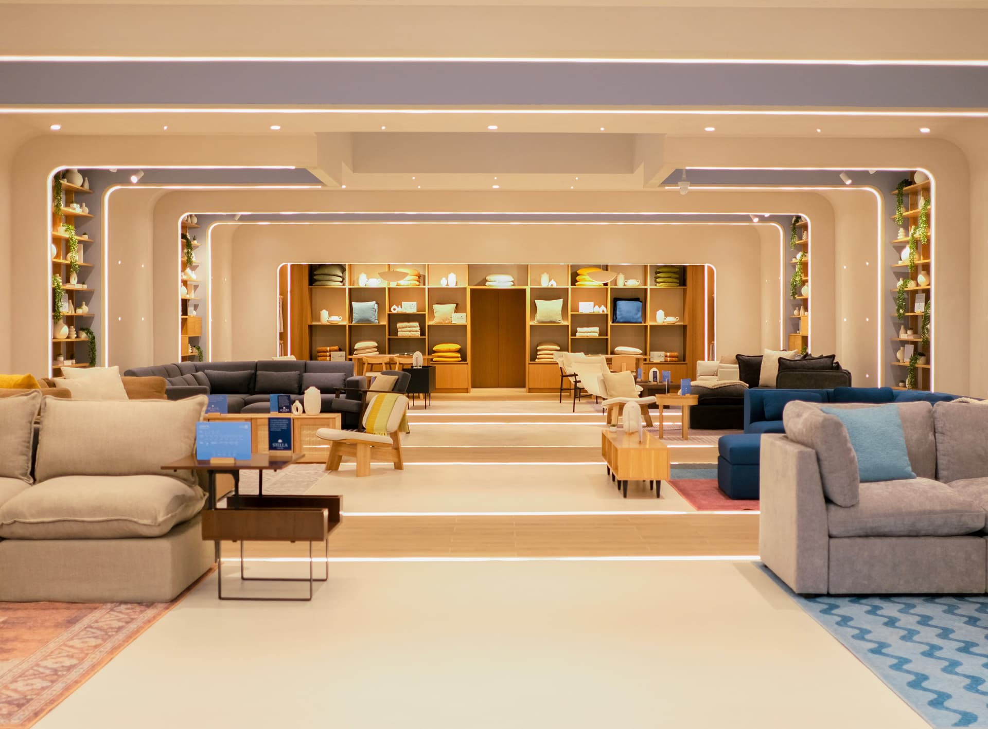 Inside the Cozey showroom with sofas and shelving