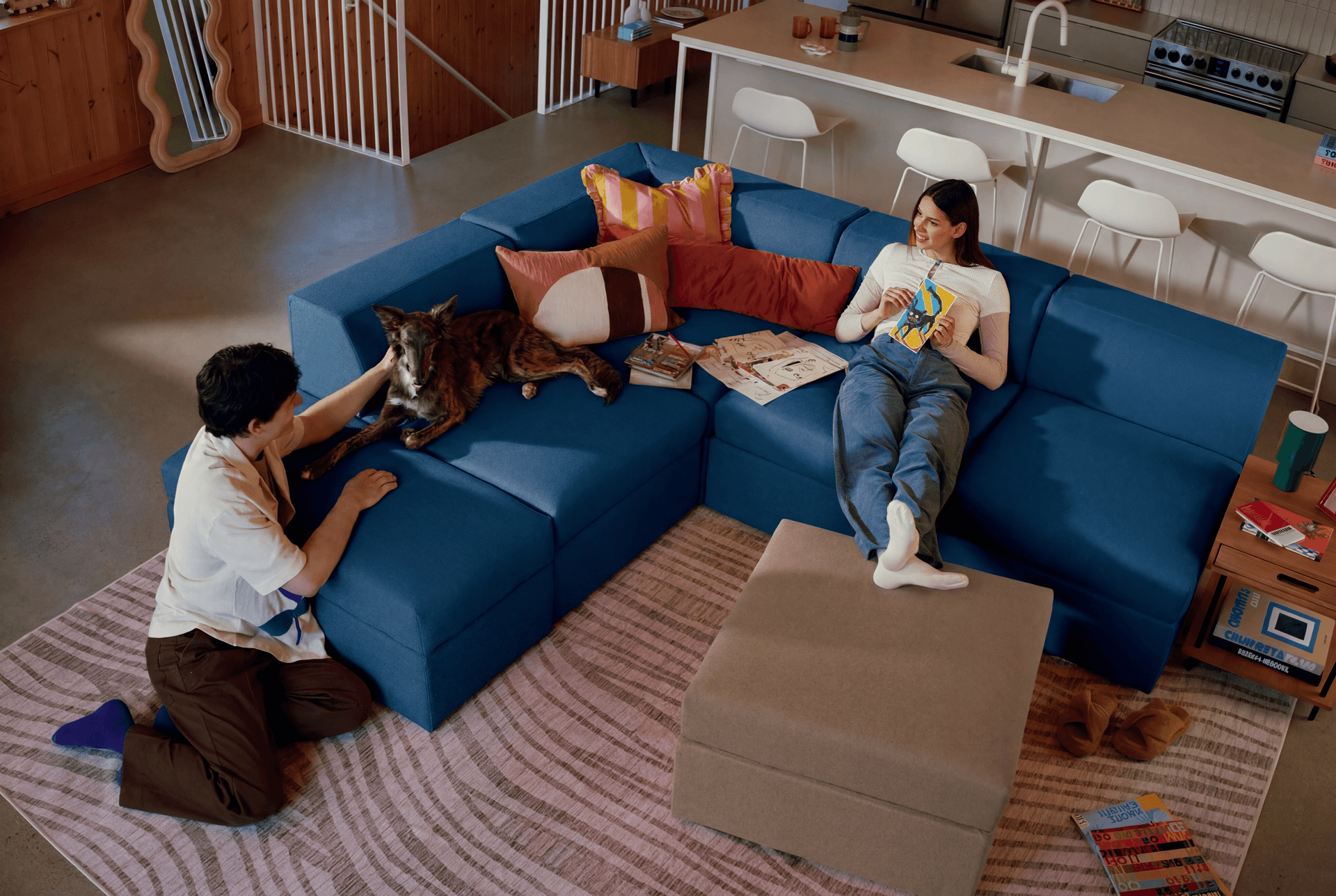 A couple sitting in their living room